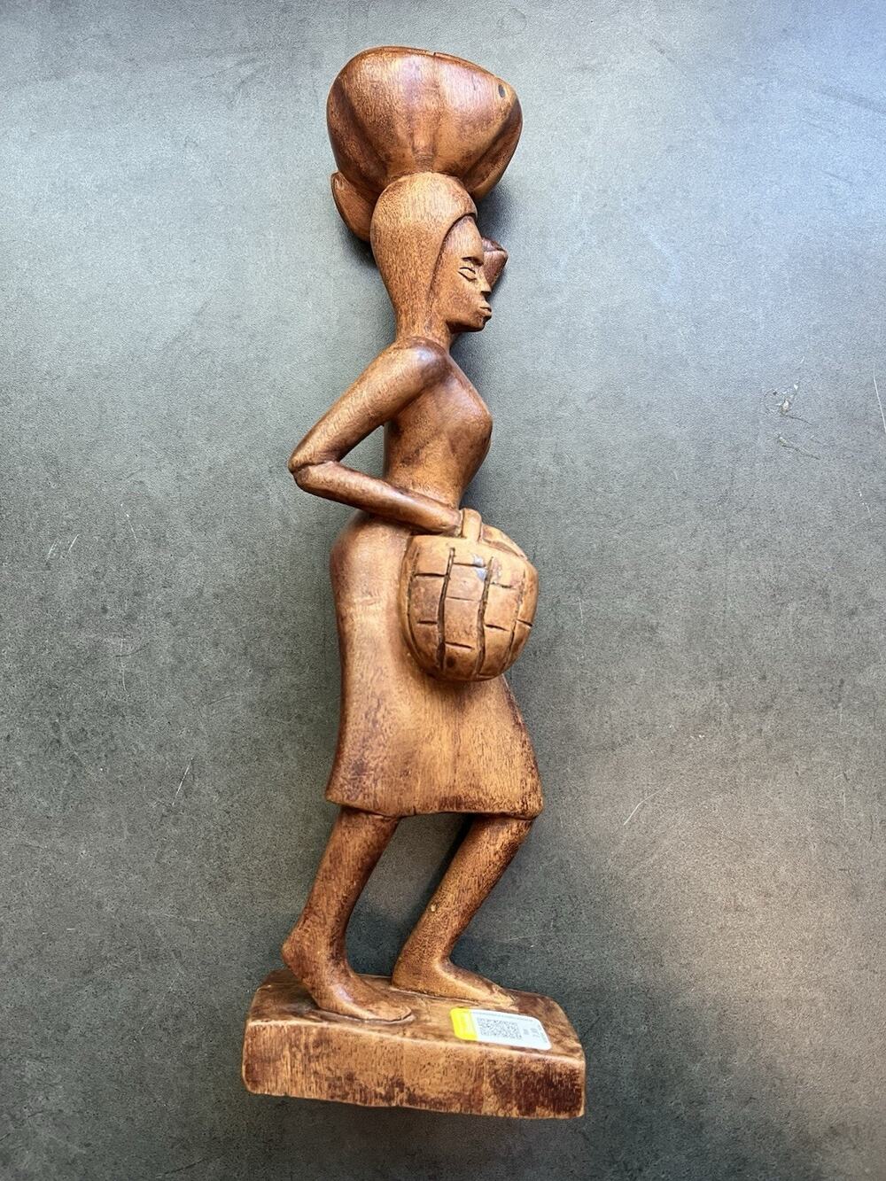 Handcarved Wood African Lady with dress Statue on pedestal carrying load on head